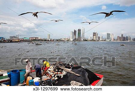 Stock Photo - Fishermen PanamB bay Panama. Fotosearch