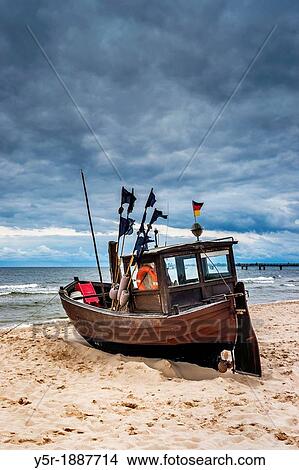 Fishing boat at the Baltic Sea near the pier of the Baltic Sea resort of Ahlbeck, Municipality of Heringsdorf, Usedom Island, County Vorpommern-Greifswald, Mecklenburg-Western Pomerania, Germany, Europe View Large Photo Image Picture - Fishing boat at the Baltic Sea near the pier of the Baltic Sea resort of Ahlbeck, Municipality of Heringsdorf, Usedom Island, County Vorpommern-Greifswald, Mecklenburg-Western Pomerania, Germany, Europe. Fotosearch