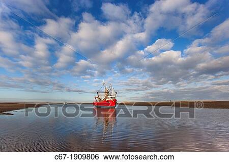 Fishing Boat Brancaster harbour mouth North Norfolk UK Winter View Large Photo Image Stock Photograph - Fishing Boat Brancaster harbour mouth North Norfolk UK Winter. Fotosearch