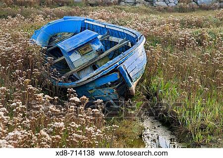 Stock Photo - Fishing boat in marsh, Marismas de Santoa Natural Reserve, Colindres, Cantabria, Spain. Fotosearch