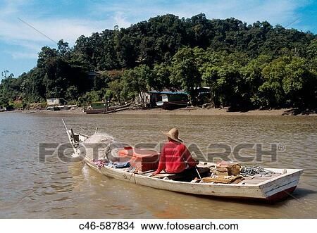 Fishing boat in river near Kuching. Sarawak. Borneo. Malaysia View Large Photo Image Picture - Fishing boat in river near Kuching. Sarawak. Borneo. Malaysia. Fotosearch