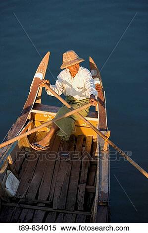 Fishing Boat on Lake Taungthaman View Large Photo Image Stock Photography - Fishing Boat on Lake Taungthaman. Fotosearch