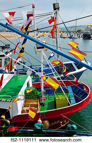 Fishing boat, San Vicente de la Barquera, Cantabria, Spain View Large Photo Image Stock Image - Fishing boat, San Vicente de la Barquera, Cantabria, Spain. Fotosearch