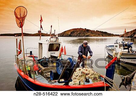 Fishing boats in Port Lligat (Cadaqu? s). Cap de Creus Natural Park. Rough Coast. Alt Empord? Region. Girona Province. Catalonia. Spain View Large Photo Image Stock Image - Fishing boats in Port Lligat (Cadaqu? s). Cap de Creus Natural Park. Rough Coast. Alt Empord? Region. Girona Province. Catalonia. Spain. Fotosearch