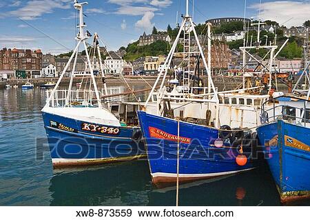 Fishing boats in the harbor at Oban, Scotland View Large Photo Image Stock Photo - Fishing boats in the harbor at Oban, Scotland. Fotosearch
