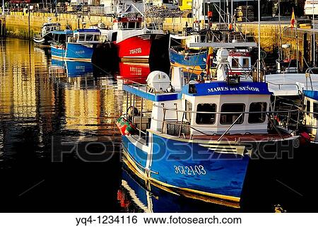 Fishing boats in the port of Ribadesella, Asturias View Large Photo Image Stock Photograph - Fishing boats in the port of Ribadesella, Asturias. Fotosearch