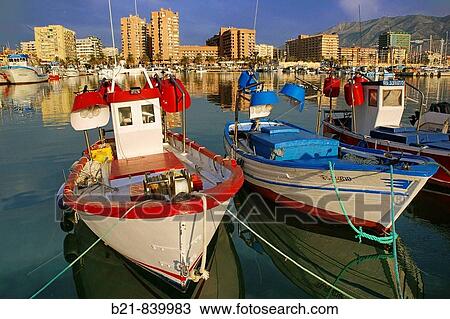 Fishing harbour and tourist resort of Fuengirola on the Costa del Sol. Malaga province, Andalusia, Spain View Large Photo Image Stock Image - Fishing harbour and tourist resort of Fuengirola on the Costa del Sol. Malaga province, Andalusia, Spain. Fotosearch