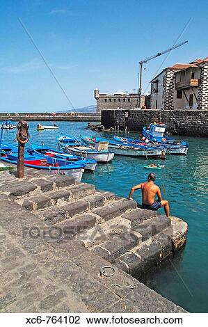 Fishing port, Puerto de la Cruz, Tenerife, Canary Islands, Spain View Large Photo Image Stock Image - Fishing port, Puerto de la Cruz, Tenerife, Canary Islands, Spain. Fotosearch