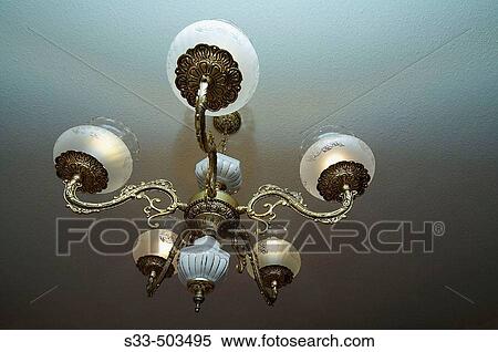 Five arms ceiling lamp turned on. View Large Photo Image Stock Photography - Five arms ceiling lamp turned on.. Fotosearch