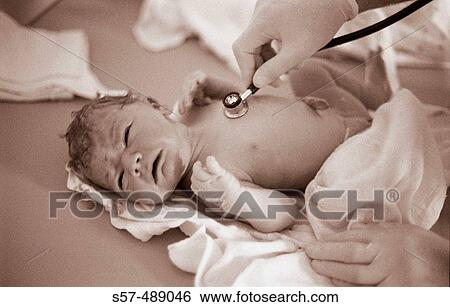 Five minutes old baby girl examined by doctor View Large Photo Image Stock Photograph - Five minutes old baby girl examined by doctor. Fotosearch