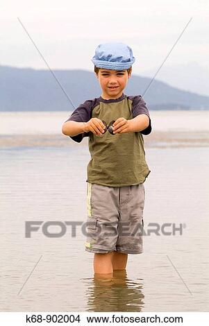 five year old boy at Spanish Banks, Vancouver, BC, Canada View Large Photo Image Picture - five year old boy at Spanish Banks, Vancouver, BC, Canada. Fotosearch