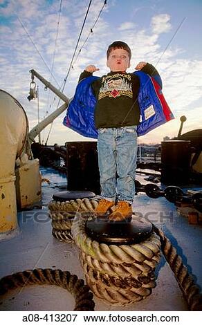 Five year old boy strikes a pose on the deck of ship? Olympia?. Philadelphia. USA. View Large Photo Image Stock Photo - Five year old boy strikes a pose on the deck of ship? Olympia?. Philadelphia. USA.. Fotosearch