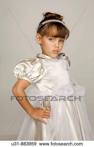 Five year old looks at the camera View Large Photo Image Stock Photo - Five year old looks at the camera. Fotosearch
