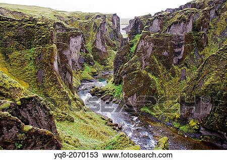Fja? rBrgljfur is a canyon in south east Iceland which is up to 100 m deep and about 2 kilometres long, with the Fja? rB river flowing through it. View Large Photo Image Stock Image - Fja? rBrgljfur is a canyon in south east Iceland which is up to 100 m deep and about 2 kilometres long, with the Fja? rB river flowing through it.. Fotosearch
