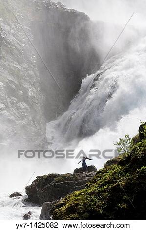 Fl? m railway Waterfall Kjosfossen show with the nymphs of the waterfall Fl? m, Aurlandsfjord, Aurland, Sogn og Fjordane, Norway View Large Photo Image Stock Image - Fl? m railway Waterfall Kjosfossen show with the nymphs of the waterfall Fl? m, Aurlandsfjord, Aurland, Sogn og Fjordane, Norway. Fotosearch