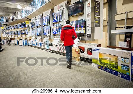 Flat-screen televisions on sale in a Best Buy electronics store in the Queens borough of New York. View Large Photo Image Picture - Flat-screen televisions on sale in a Best Buy electronics store in the Queens borough of New York.. Fotosearch