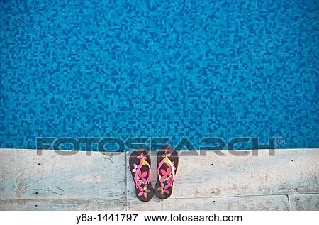 Flip-flops at poolside View Large Photo Image Stock Photo - Flip-flops at poolside. Fotosearch