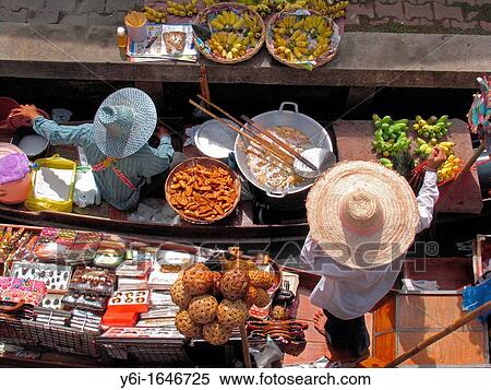 Floating Market tourist attraction Damnoen Saduak near Bangok Thailand View Large Photo Image Stock Photography - Floating Market tourist attraction Damnoen Saduak near Bangok Thailand. Fotosearch