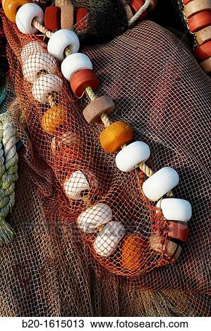 Floats and fishing nets, fishing gear maritime, port, Hendaye, Aquitaine, Basque Country, Pyren? es Atlantiques, France View Large Photo Image Stock Image - Floats and fishing nets, fishing gear maritime, port, Hendaye, Aquitaine, Basque Country, Pyren? es Atlantiques, France. Fotosearch