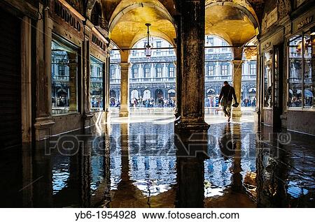Flooded street by the? Acqua Alta? leading to St. Mark's Square, Venice, Italy. View Large Photo Image Stock Photo - Flooded street by the? Acqua Alta? leading to St. Mark's Square, Venice, Italy.. Fotosearch