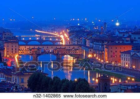 Florence, Arno river at Dusk, Ponte Vecchio at dusk, Tuscany, Italy View Large Photo Image Stock Photography - Florence, Arno river at Dusk, Ponte Vecchio at dusk, Tuscany, Italy. Fotosearch