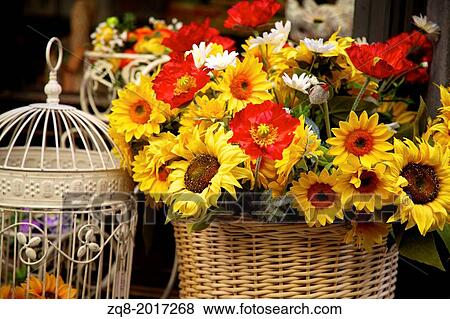 Stock Photo - Florence, Italy flowers in a basket.. Fotosearch