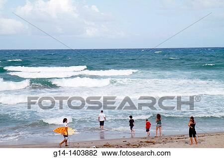 Stock Image - Florida, Boca Raton, public beach, Atlantic Ocean, surfer, beachcomber,. Fotosearch