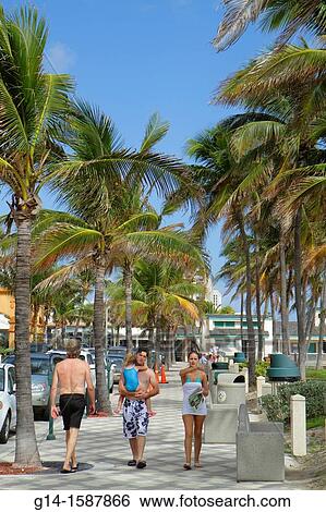 Florida, Deerfield Beach, Ocean Way, Atlantic Ocean, coast, shore, sunbathers, man, woman, couple, family, girl, View Large Photo Image Stock Photograph - Florida, Deerfield Beach, Ocean Way, Atlantic Ocean, coast, shore, sunbathers, man, woman, couple, family, girl,. Fotosearch