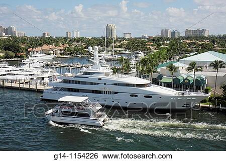 Florida, Fort Ft Lauderdale, 17th Street Causeway Bridge, view, Intracoastal Waterway, Stranahan River, boat, boating, waterfront, skyline, marina, luxury, mega yacht, watercraft, skyline, mooring, riverfront cruise, sightseeing, View Large Photo Image Stock Photograph - Florida, Fort Ft Lauderdale, 17th Street Causeway Bridge, view, Intracoastal Waterway, Stranahan River, boat, boating, waterfront, skyline, marina, luxury, mega yacht, watercraft, skyline, mooring, riverfront cruise, sightseeing,. Fotosearch