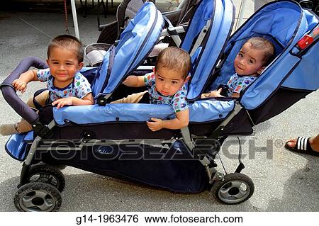 Florida, Homestead, US Route 1, Redlands Farmers Market, Bargain Town, triplets, twins, Hispanic, boy, identical, unidentical, baby stroller,. View Large Photo Image Stock Photograph - Florida, Homestead, US Route 1, Redlands Farmers Market, Bargain Town, triplets, twins, Hispanic, boy, identical, unidentical, baby stroller,.. Fotosearch