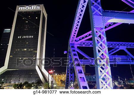 Florida, Jacksonville, Saint St Johns River, John Alsop Bridge, Main Street Bridge, landmark, vertical lift tower, steel frame, structure, Modis Building, skyscraper, water reflection, downtown, waterfront, Go Jaguars, football, View Large Photo Image Stock Photo - Florida, Jacksonville, Saint St Johns River, John Alsop Bridge, Main Street Bridge, landmark, vertical lift tower, steel frame, structure, Modis Building, skyscraper, water reflection, downtown, waterfront, Go Jaguars, football,. Fotosearch