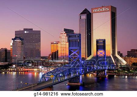 Florida, Jacksonville, Saint St Johns River, John Alsop Bridge, Main Street Bridge, downtown, Jacksonville Landing, city skyline, Modis Building, skyscraper, dusk, night, nightlife, sunset, reflection, glass, View Large Photo Image Stock Photograph - Florida, Jacksonville, Saint St Johns River, John Alsop Bridge, Main Street Bridge, downtown, Jacksonville Landing, city skyline, Modis Building, skyscraper, dusk, night, nightlife, sunset, reflection, glass,. Fotosearch
