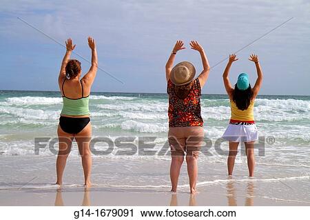 Florida, Miami Beach, Atlantic Ocean, shore, surf, waves, yoga class, woman, women, exercising, View Large Photo Image Stock Image - Florida, Miami Beach, Atlantic Ocean, shore, surf, waves, yoga class, woman, women, exercising,. Fotosearch