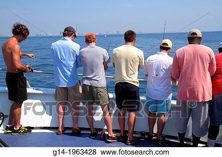 Florida, Miami Beach, Atlantic Ocean, water, charter fishing boat, onboard, Black, man, waiting, rods, deep sea, standing room only,. View Large Photo Image Stock Photo - Florida, Miami Beach, Atlantic Ocean, water, charter fishing boat, onboard, Black, man, waiting, rods, deep sea, standing room only,.. Fotosearch