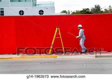 Florida, Miami Beach, Collins Avenue, red, wall, yellow, ladder, construction, worker, man, hard hat,. View Large Photo Image Stock Image - Florida, Miami Beach, Collins Avenue, red, wall, yellow, ladder, construction, worker, man, hard hat,.. Fotosearch