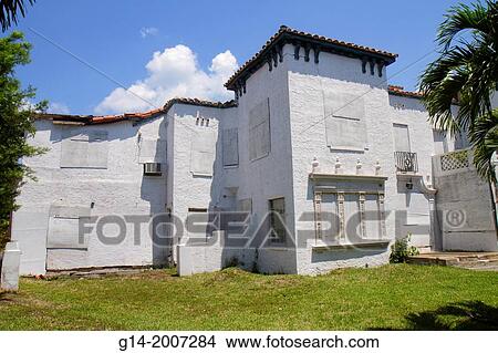 Florida, Miami Beach, house, home, mansion, vacant, boarded up, real estate, abandoned, empty, crisis, financial, bubble, foreclosures,. View Large Photo Image Picture - Florida, Miami Beach, house, home, mansion, vacant, boarded up, real estate, abandoned, empty, crisis, financial, bubble, foreclosures,.. Fotosearch