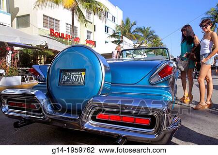 Florida, Miami Beach, Ocean Drive, Art Deco Weekend, festival, event, antique, car, automobile, 1958 Mercury Park Lane Convertible, Hispanic, woman,. View Large Photo Image Stock Image - Florida, Miami Beach, Ocean Drive, Art Deco Weekend, festival, event, antique, car, automobile, 1958 Mercury Park Lane Convertible, Hispanic, woman,.. Fotosearch