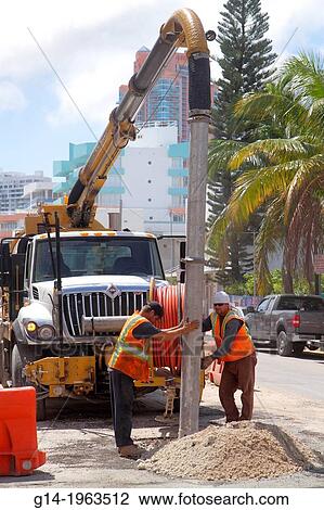 Florida, Miami Beach, Ocean Drive, road, construction, repair, capital improvements, city workers, vacuum, truck, equipment, man,. View Large Photo Image Stock Image - Florida, Miami Beach, Ocean Drive, road, construction, repair, capital improvements, city workers, vacuum, truck, equipment, man,.. Fotosearch