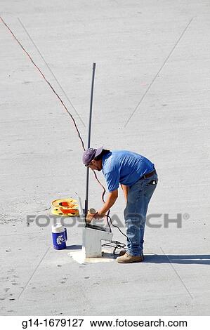 Florida, Miami Beach, Ocean Drive, building roof, rooftop, Hispanic, man, worker, installer, air duct, pcv pipe, construction, renovation, applying glue, View Large Photo Image Stock Photo - Florida, Miami Beach, Ocean Drive, building roof, rooftop, Hispanic, man, worker, installer, air duct, pcv pipe, construction, renovation, applying glue,. Fotosearch