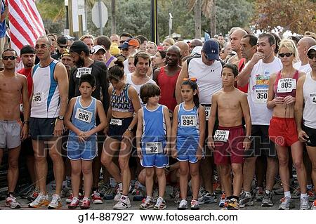 Stock Photo - Florida, Miami Beach,? Ocean Drive?, South Pointe 5K Run, benefit, runners, race, compete, starting line, Hispanic, Black, man, woman, boy, girl, child, family, multi ethnic, sport, exercise, fitness, health,. Fotosearch