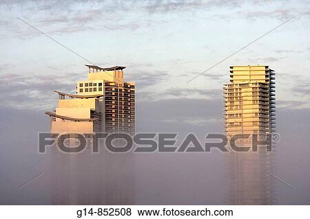 Florida, Miami Beach, South Pointe, Murano, Icon, high rise, condominium, fog, low, visibility, weather, building, architecture, modern, top floors, View Large Photo Image Stock Photo - Florida, Miami Beach, South Pointe, Murano, Icon, high rise, condominium, fog, low, visibility, weather, building, architecture, modern, top floors,. Fotosearch