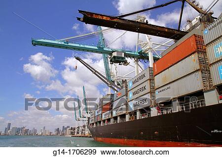 Florida, Miami, Biscayne Bay, Port of Miami, Dodge Island, cargo container ship, cranes, Maersk, Sealand, city skyline, View Large Photo Image Stock Photo - Florida, Miami, Biscayne Bay, Port of Miami, Dodge Island, cargo container ship, cranes, Maersk, Sealand, city skyline,. Fotosearch