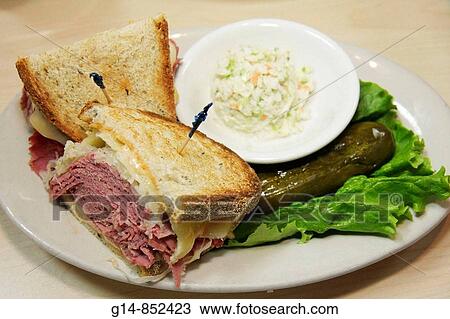 Stock Image - Florida, Miami, Coral Gables, Bagel Emporium and Grille, restaurant, deli, plate, food, pastrami, Reuben, sandwich, coleslaw, pickle, rye bread,. Fotosearch
