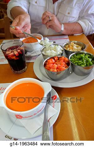 Florida, Miami, Coral Gables, Delicias de Espana, restaurant, Spanish, food, gazpacho, soup, condiments, sangria, woman,. View Large Photo Image Picture - Florida, Miami, Coral Gables, Delicias de Espana, restaurant, Spanish, food, gazpacho, soup, condiments, sangria, woman,.. Fotosearch