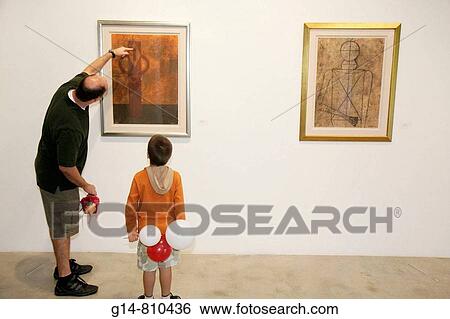 Florida, Miami, Miami Art Central, Festival Mexico Miami, gallery, Rufino Tamayo prints, exhibition, Mexican artist, man, boy, father, son, point, teach, culture, heritage, View Large Photo Image Stock Photograph - Florida, Miami, Miami Art Central, Festival Mexico Miami, gallery, Rufino Tamayo prints, exhibition, Mexican artist, man, boy, father, son, point, teach, culture, heritage,. Fotosearch