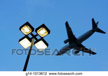 Florida, Miami, street lamp, jet, airplane, airport approach, commercial airliner, View Large Photo Image Stock Image - Florida, Miami, street lamp, jet, airplane, airport approach, commercial airliner,. Fotosearch