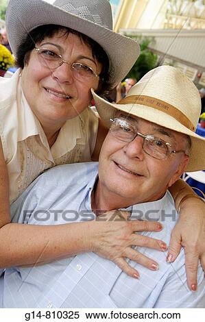 Florida, Miami, Tropical Park, Cuban Exodus Relief Project, festival, political, exile, Diaspora, Hispanic, man, woman, couple, hug, hugging, wife, husband, senior, straw hat, View Large Photo Image Stock Photography - Florida, Miami, Tropical Park, Cuban Exodus Relief Project, festival, political, exile, Diaspora, Hispanic, man, woman, couple, hug, hugging, wife, husband, senior, straw hat,. Fotosearch