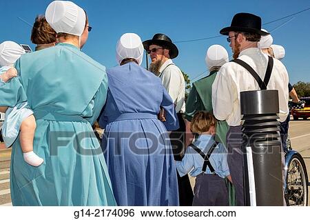 Florida, Sarasota, Pine Craft, Amish, Mennonite, community, winter retreat, traditional, conservative, clothing, religious, Bahia Vista Street, Amish, man, woman, couple, family, boy, girl, father, mother, son, daughter, multi generational, walking, hat,. View Large Photo Image Stock Photograph - Florida, Sarasota, Pine Craft, Amish, Mennonite, community, winter retreat, traditional, conservative, clothing, religious, Bahia Vista Street, Amish, man, woman, couple, family, boy, girl, father, mother, son, daughter, multi generational, walking, hat,.. Fotosearch