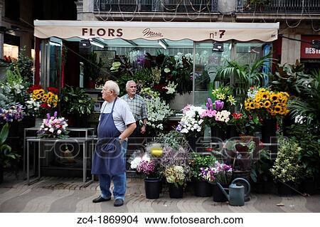 Flourist selling flowers at la Rambla, Catalonia, Spain View Large Photo Image Picture - Flourist selling flowers at la Rambla, Catalonia, Spain. Fotosearch