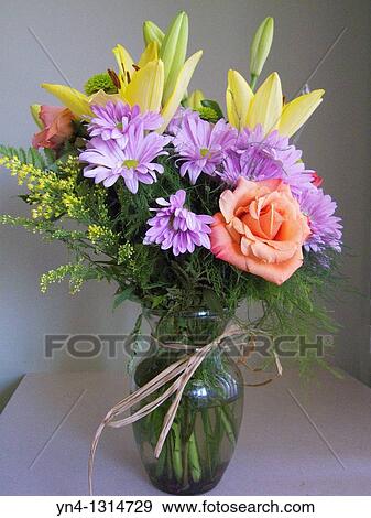 Flower arraingment in glass vase View Large Photo Image Stock Photo - Flower arraingment in glass vase. Fotosearch